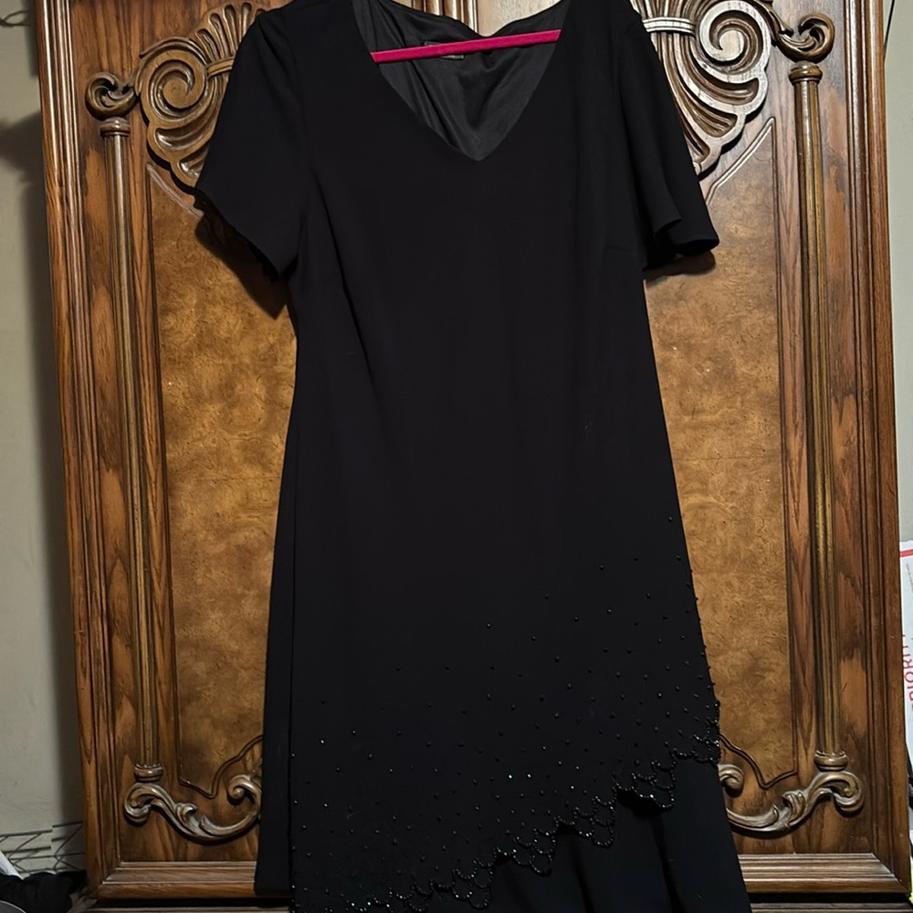 R Dress barn black dress with beautiful details on bottom edge